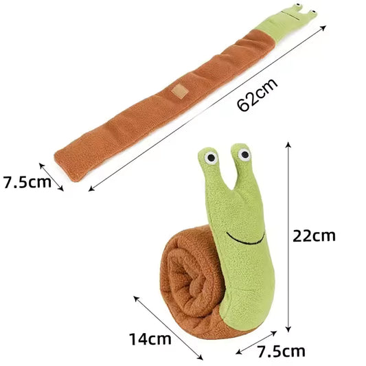Green plush snail toy with brown shell and measurements on a white background