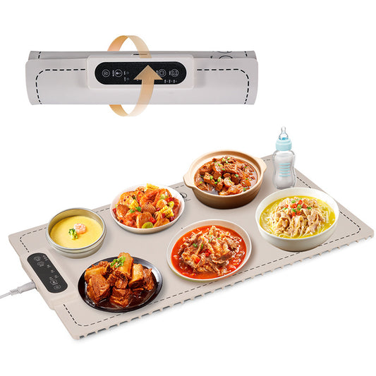Portable food warmer with multiple bowls of food on a white background